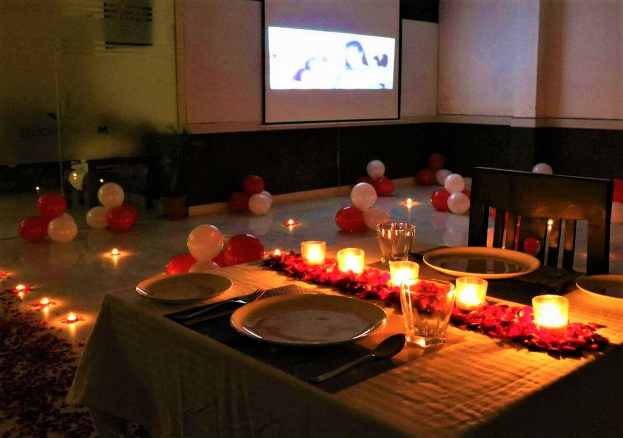 private movie screening romantic candle light dinner 